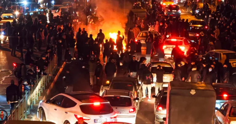 Iranians look for loved ones at morgue, with over 12,000 feared dead after protests