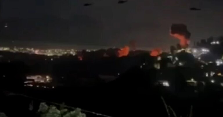 Helicopters seen flying above Caracas amid explosions