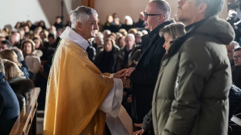 Mother says goodbye to her son as Swiss community grieves after deadly fire