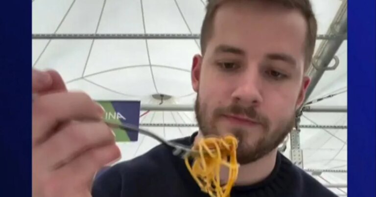 Pasta frenzy inside the Olympic village in Milan