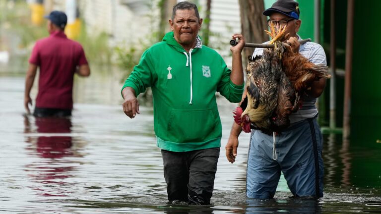 Colombia’s president urges court to allow raising taxes by decree as floods hit northern region
