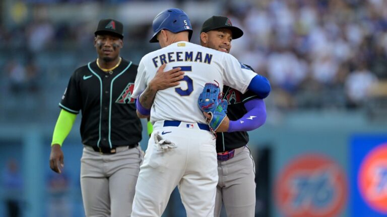 Dodgers’ Freeman laughs off being tagged out by Marte with hug