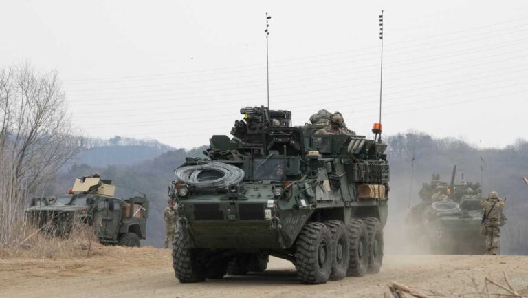 North Korea fires missiles toward sea in show of force