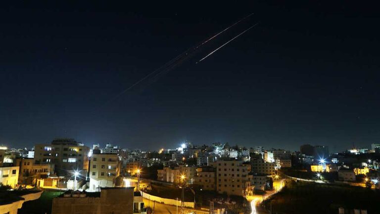 Iran lashes out with attacks on Israel and Gulf neighbors as Israel hits Beirut