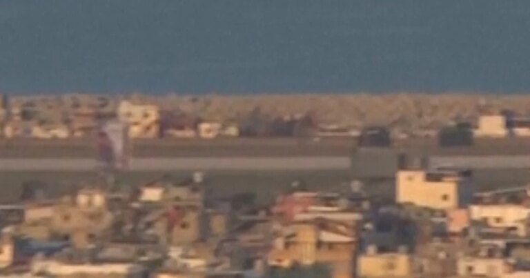 Commercial plane seen taking off amid Beirut explosions