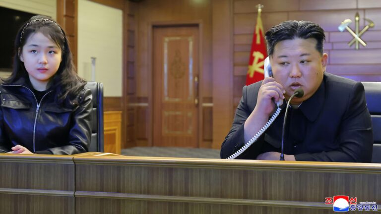 North Korean leader Kim watches cruise missile tests with his daughter