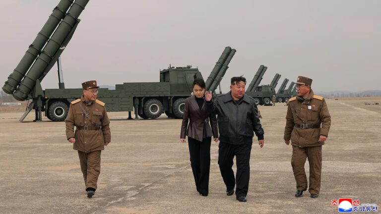 North Korean leader Kim observes test of rocket launch systems with his daughter