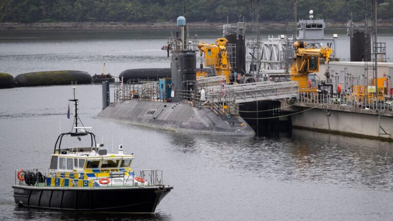Iranian and Romanian charged after trying to enter UK’s nuclear submarine base